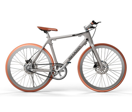 Ein graues SHARP Hybrid E-Bike mit braunem Sattel und orangefarbenen Reifen.