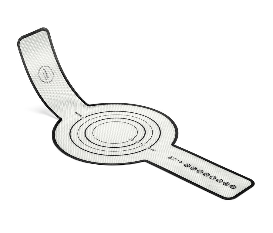 Eine Dauerbackmatte mit aufgedruckten Kreisen in Zentimetern und Zoll.