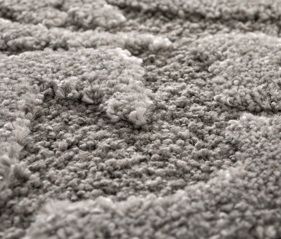 Detailaufnahme eines grauen Teppichs »Cosmo «Waves.