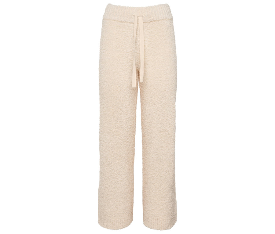 Cremefarbene Strickhose mit Kordelzug.