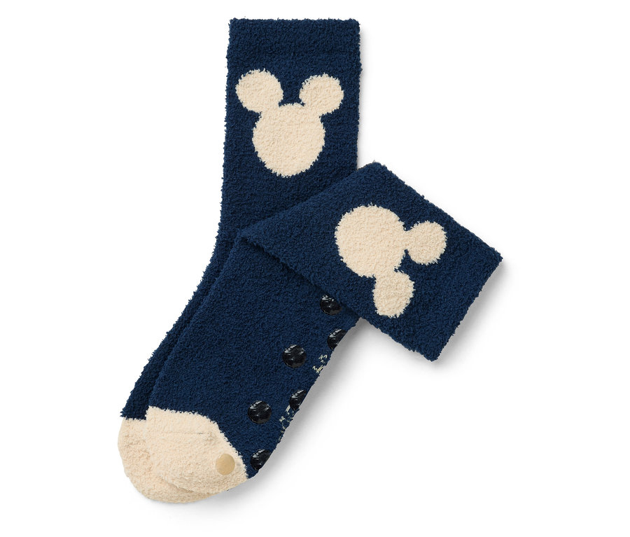 Zwei marineblaue Socken mit cremefarbenen Mickey Mouse Motiven und Anti-Rutsch-Noppen an den Fußsohlen.