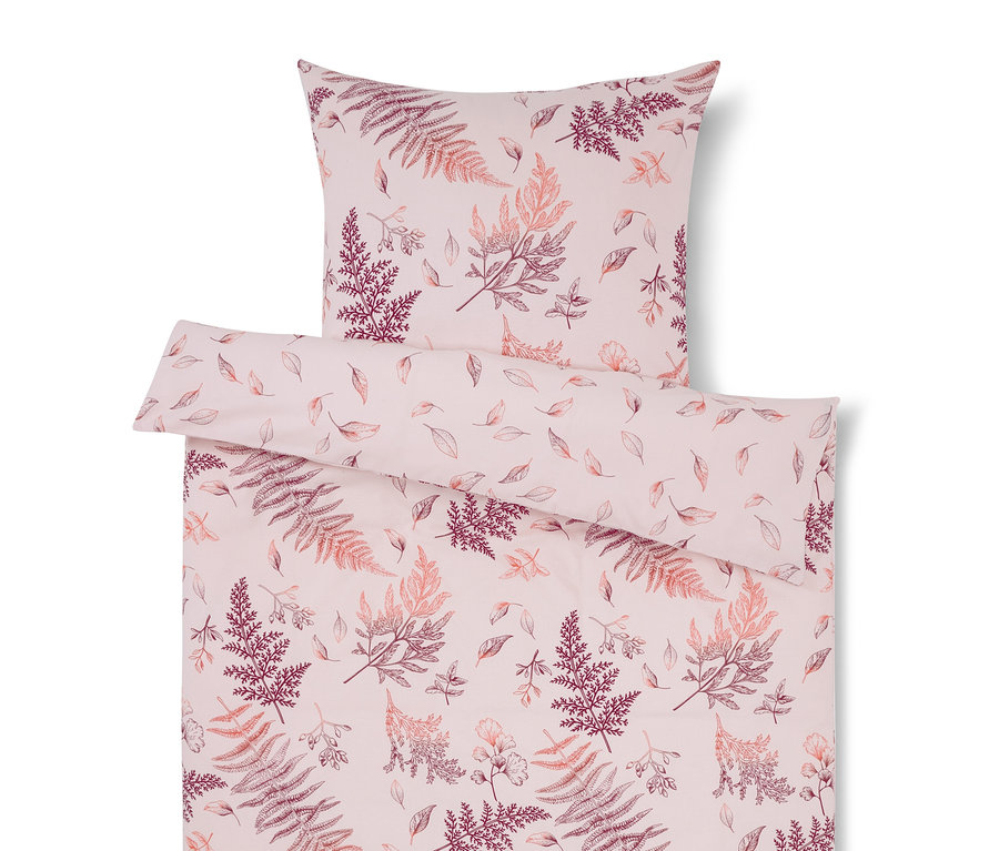 Rosa Bettwäsche mit Blättermuster.