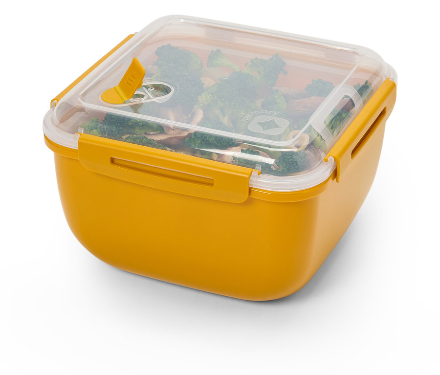 Gelbe Lunchbox mit Brokkoli und Pilzen.