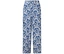 Eine lange, weite Hose mit blau-weißem Muster.