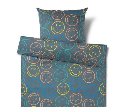 Dunkelgraue Bettwäsche mit einem Muster aus bunten Smileys in Gelb, Blau, Orange und Türkis, einige lächeln, zwinkern oder zeigen Pfeile.