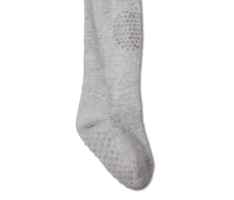 Detailaufnahme einer grauen Strumpfhose (2 Stück) für Kinder mit Anti-Rutsch-Noppen an Knie und Fuß.