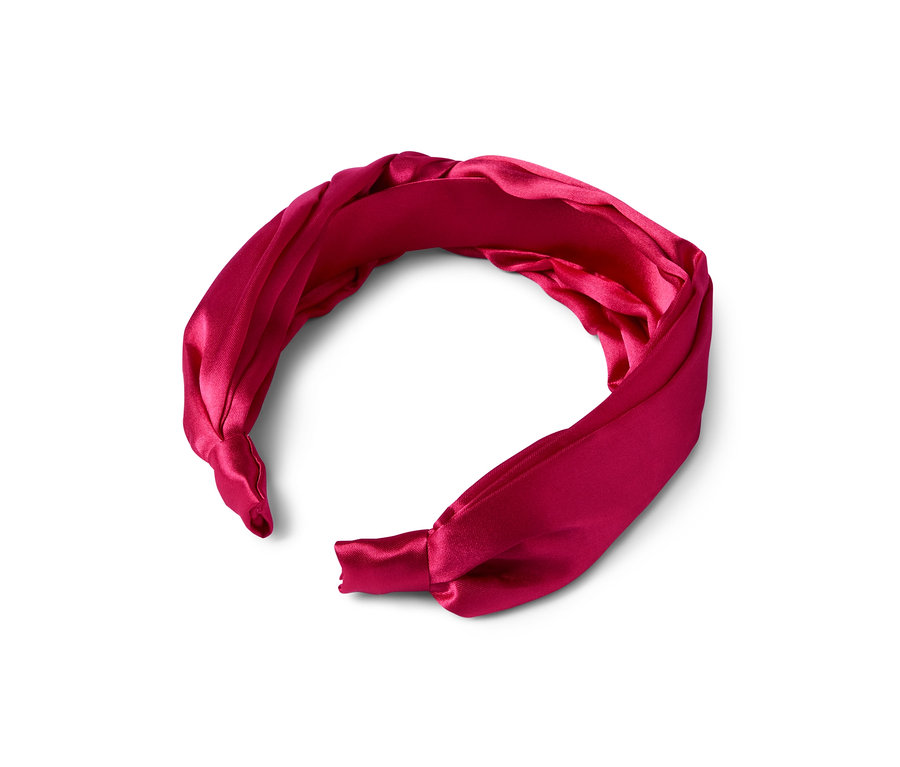 Haarreif auf weißem Hintergrund.