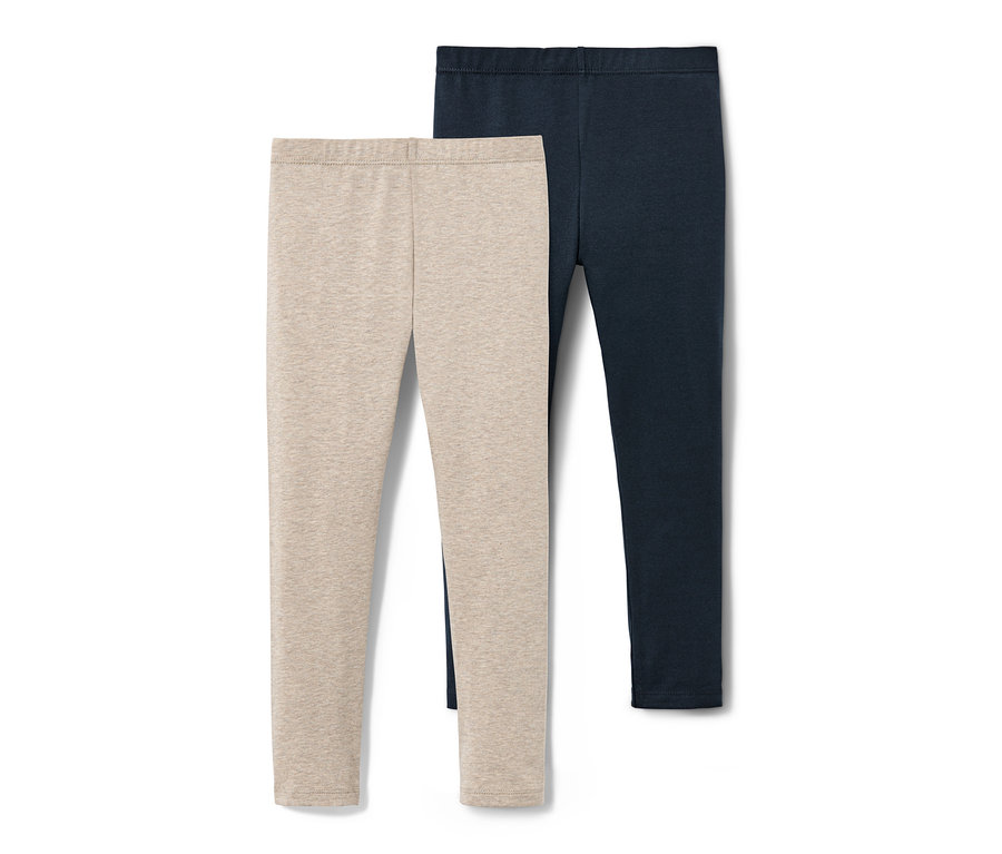 Zwei Leggings, eine beige und eine dunkelblaue.