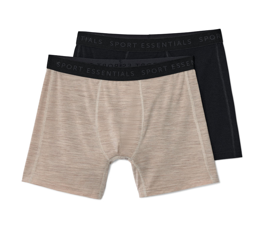 Zwei beige Slipboxer mit Merinowolle liegen übereinander.