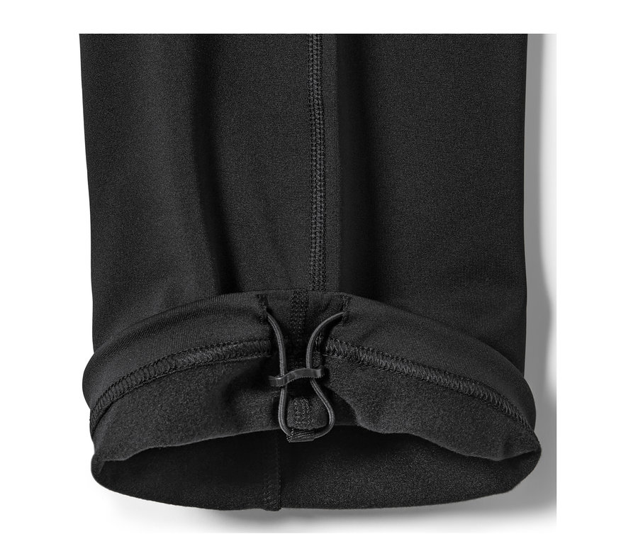 Detail einer schwarzen Thermohose mit Kordelzug am Saum.