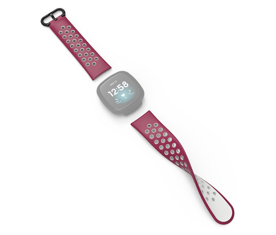 Ein zerlegtes Smartwatch-Armband mit perforiertem Design und einem silbernen Uhrengehäuse in der Mitte auf einem weißen Hintergrund.
