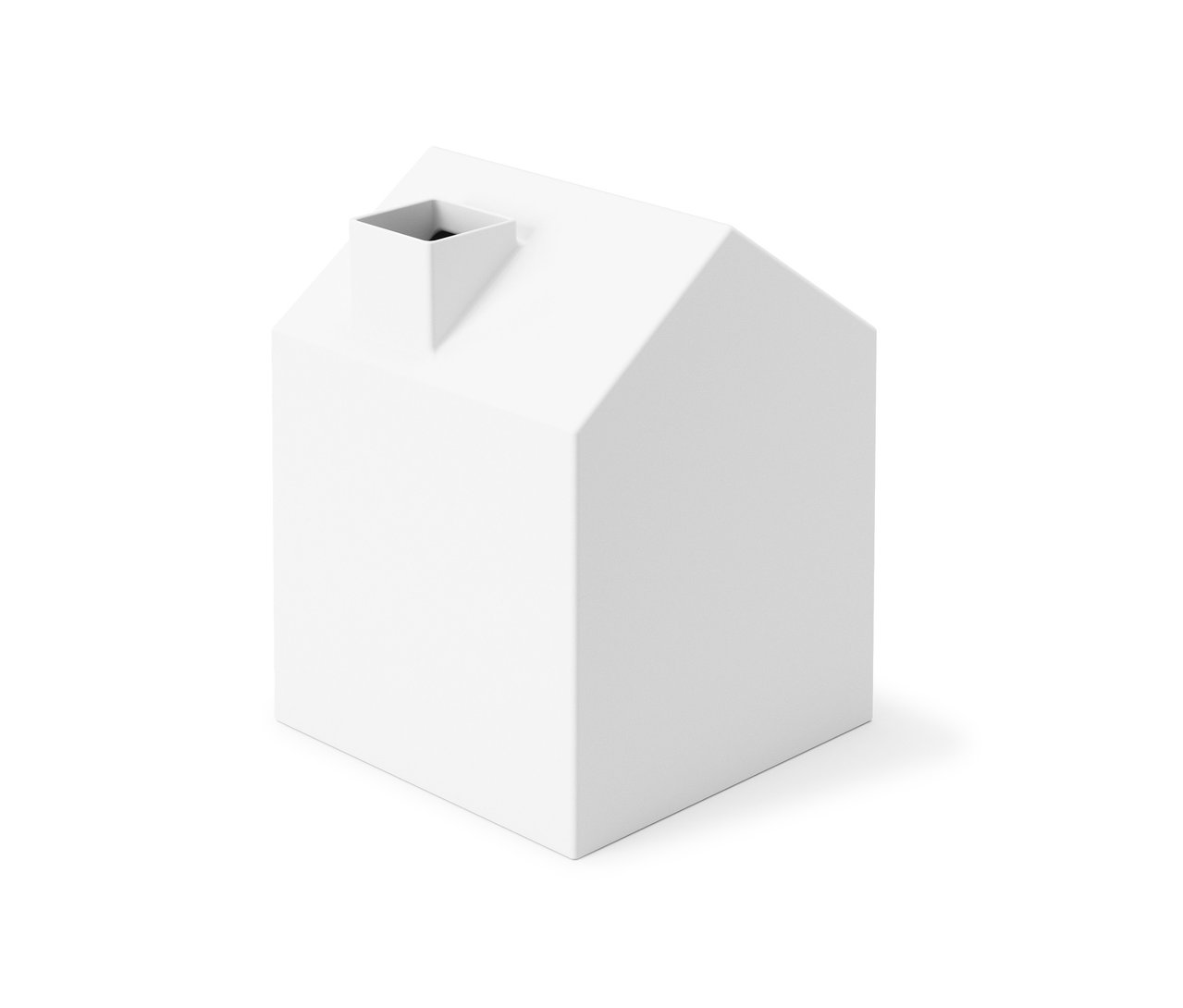 Eine weiße Kosmetiktücher-Box »Casa« in Form eines Hauses mit Schornstein.