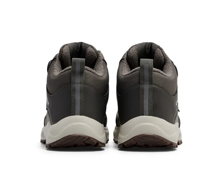 Zwei dunkelgraue hummel® Turnschuhe »Root Tex Jr« von hinten, mit hellgrauer Sohle und brauner Laufsohle.