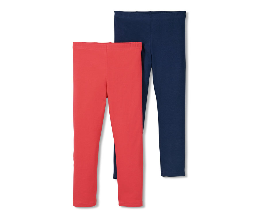 Zwei Leggings: eine korallenrote und eine dunkelblaue.