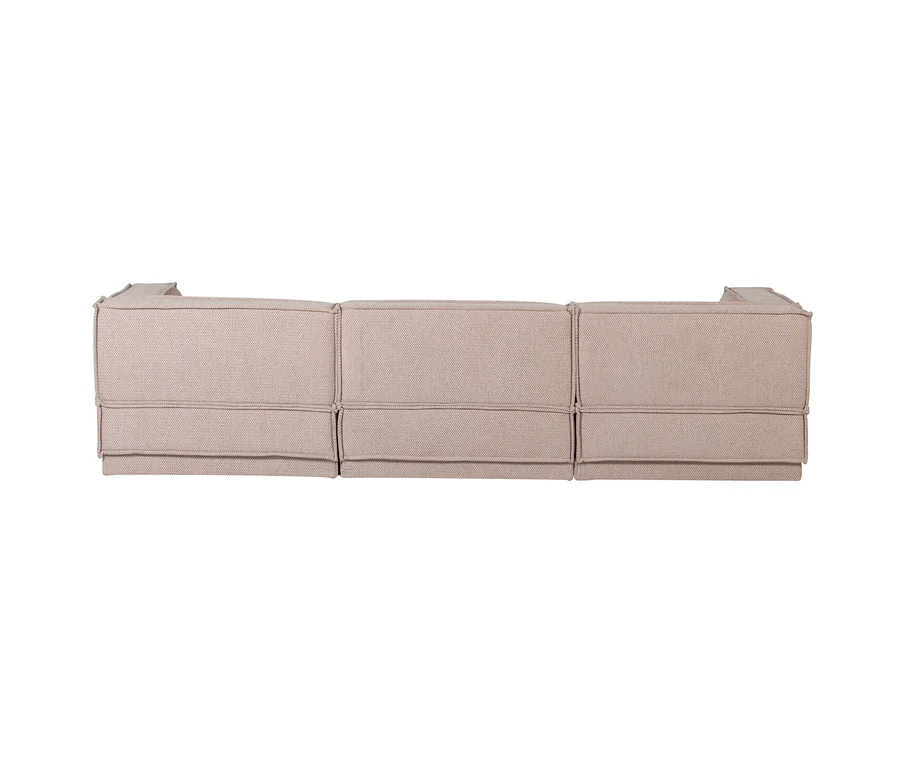 Rückenansicht eines dreiteiligen modularen Sofas in hellem Beigeton.