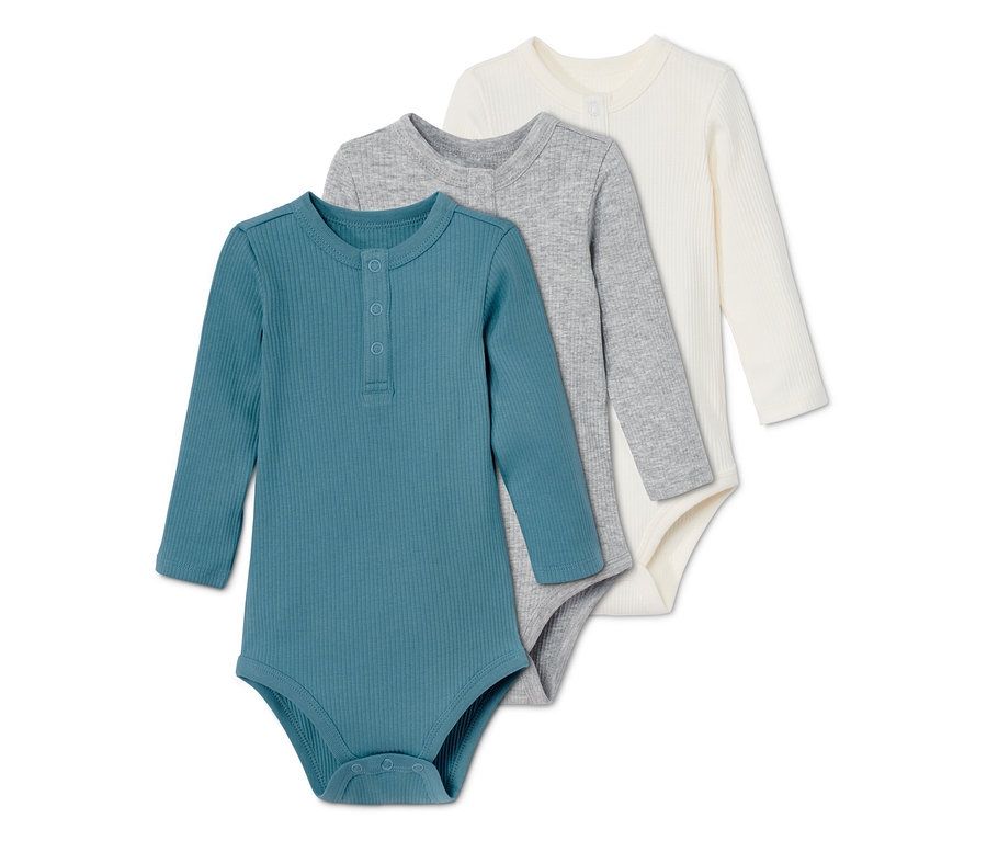 Drei Langarmbodys in Blau, Grau und Creme.