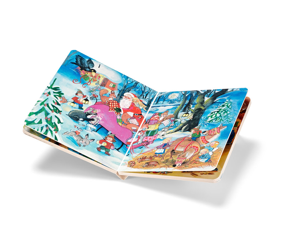 Ein aufgeschlagenes Buch mit einer Illustration einer Weihnachtsszene mit dem Weihnachtsmann und Tieren.