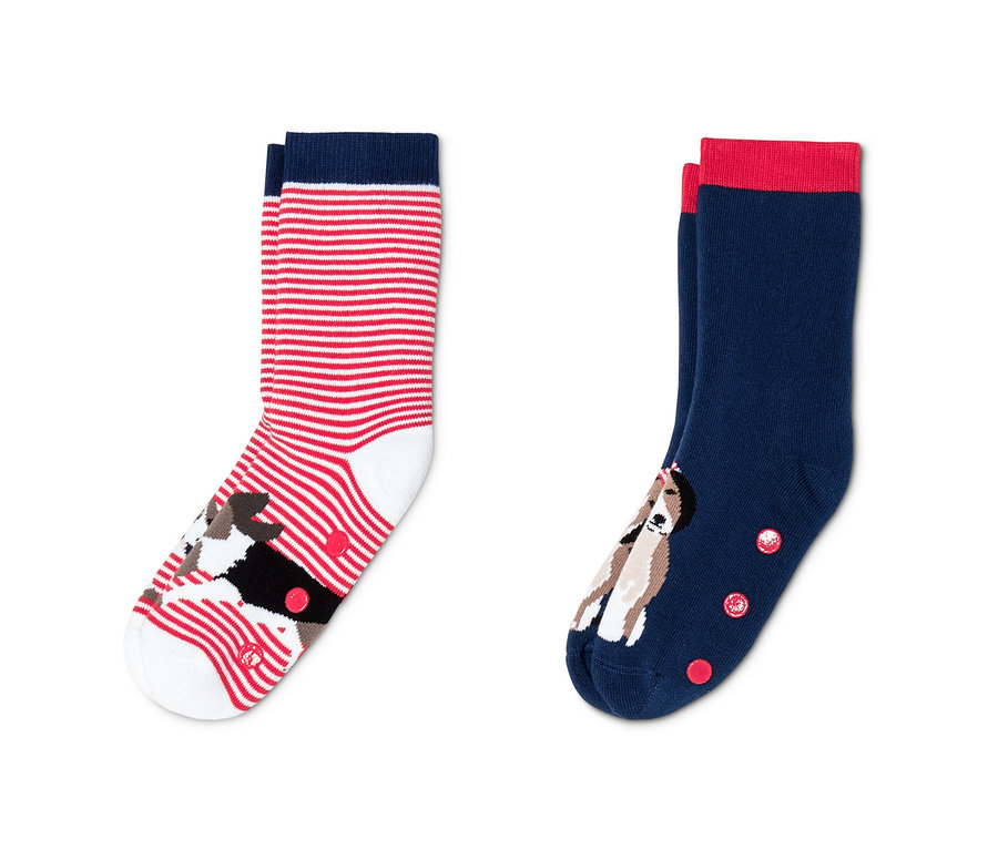 Zwei Paar Antirutsch-Socken mit Hundemotiven.