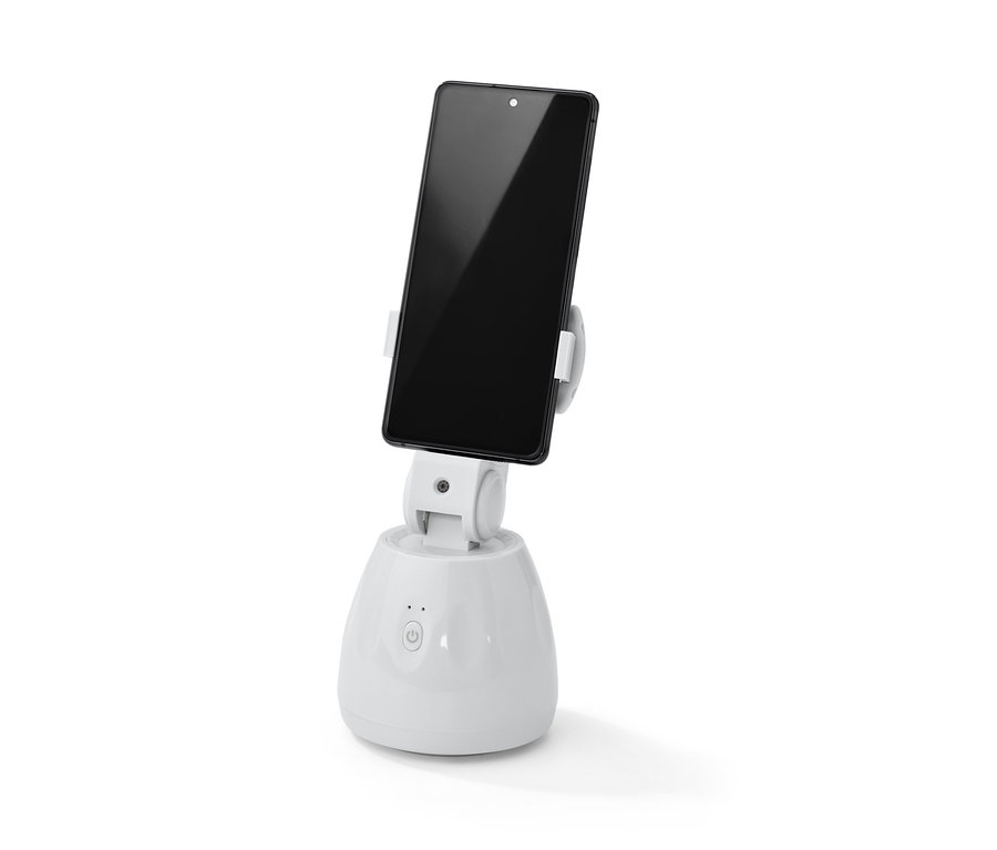 Ein Mobiltelefon befindet sich in einer weißen Handyhalterung mit Bewegungssensor.
