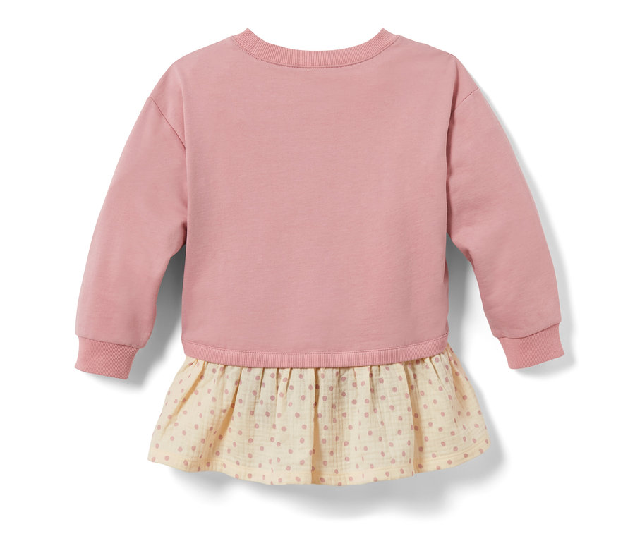 Rosa Kinder-Sweatshirt mit langen Ärmeln und cremefarbenem Unterteil mit rosa Punkten.