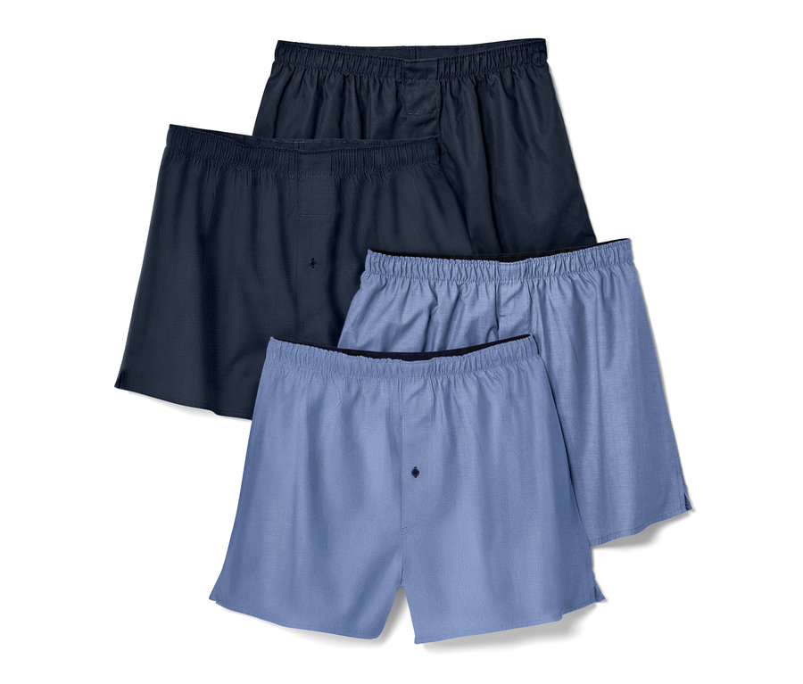 Vier Web-Boxershorts in Blautönen.