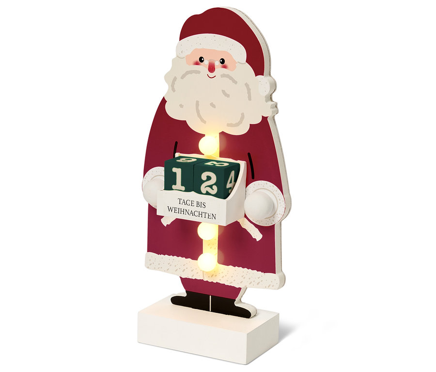 Eine hölzerne Weihnachtsmann-Figur mit Adventskalender.