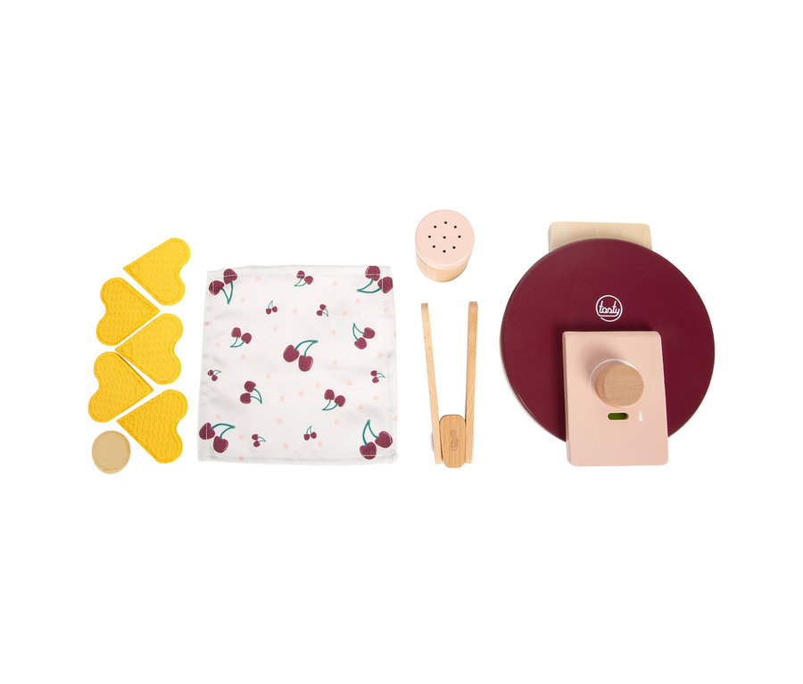 Rotes small foot Waffeleisen-Set "tasty" aus Holz mit herzförmigen Waffeln, Kirsch-Tuch, Zange und Streuer.