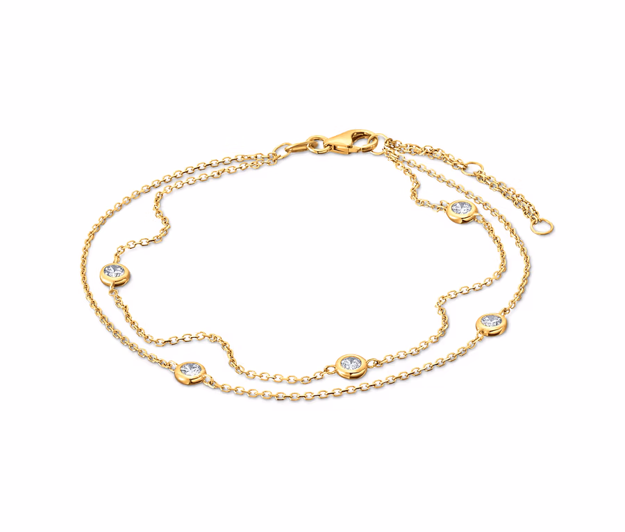 Ein goldenes Armband mit Zirkonia.