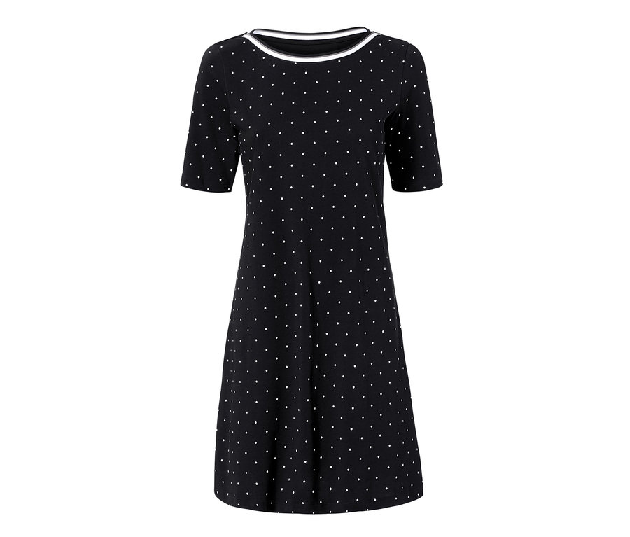 Schwarzes Jerseykleid im Punkte-Dessin.