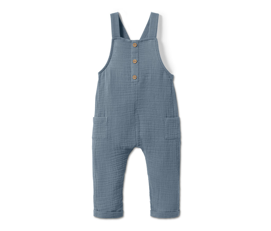 Eine blaue Latzhose mit Knöpfen und Taschen.