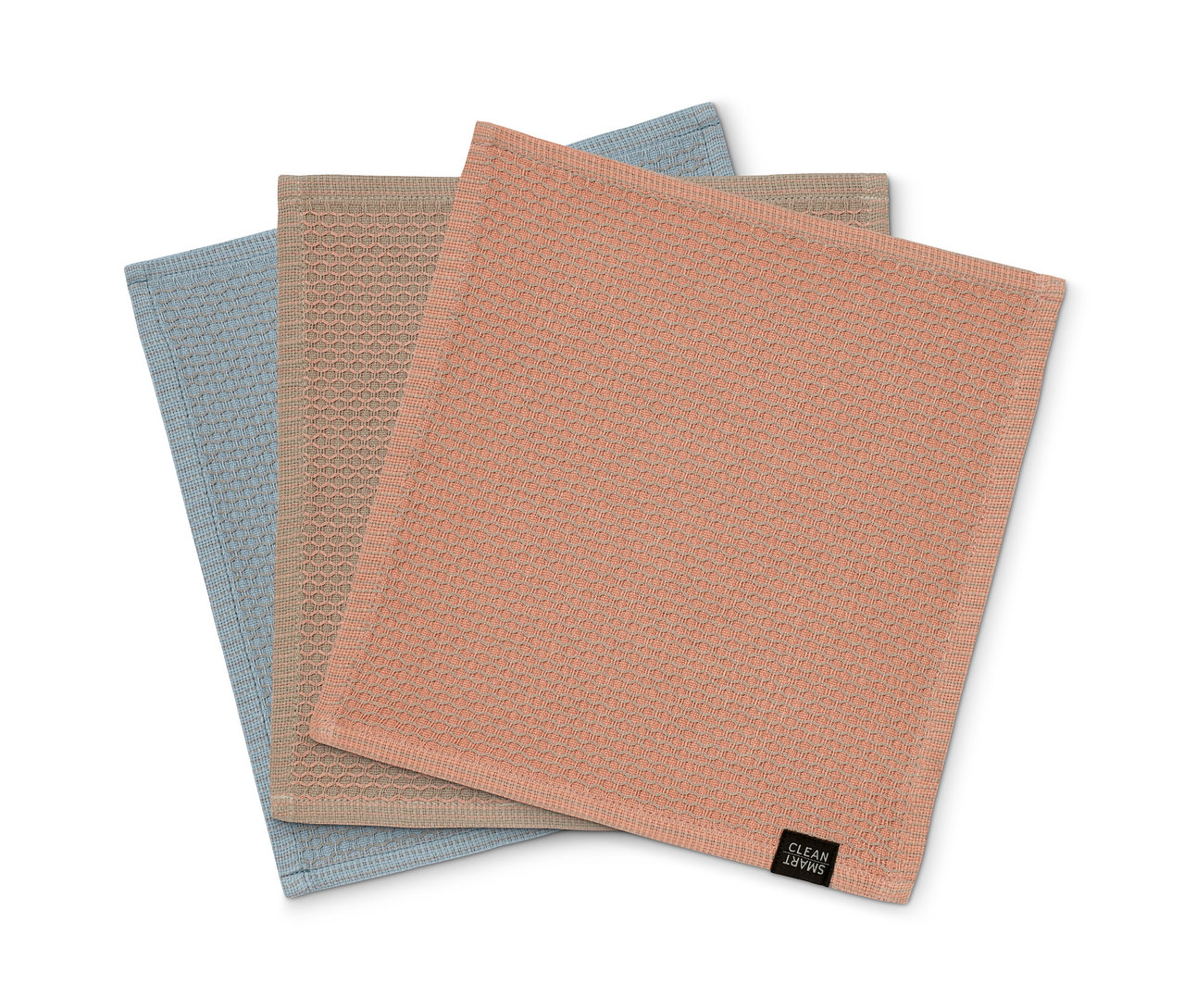 Drei Spültücher liegen übereinander, in blau, beige und rosa.