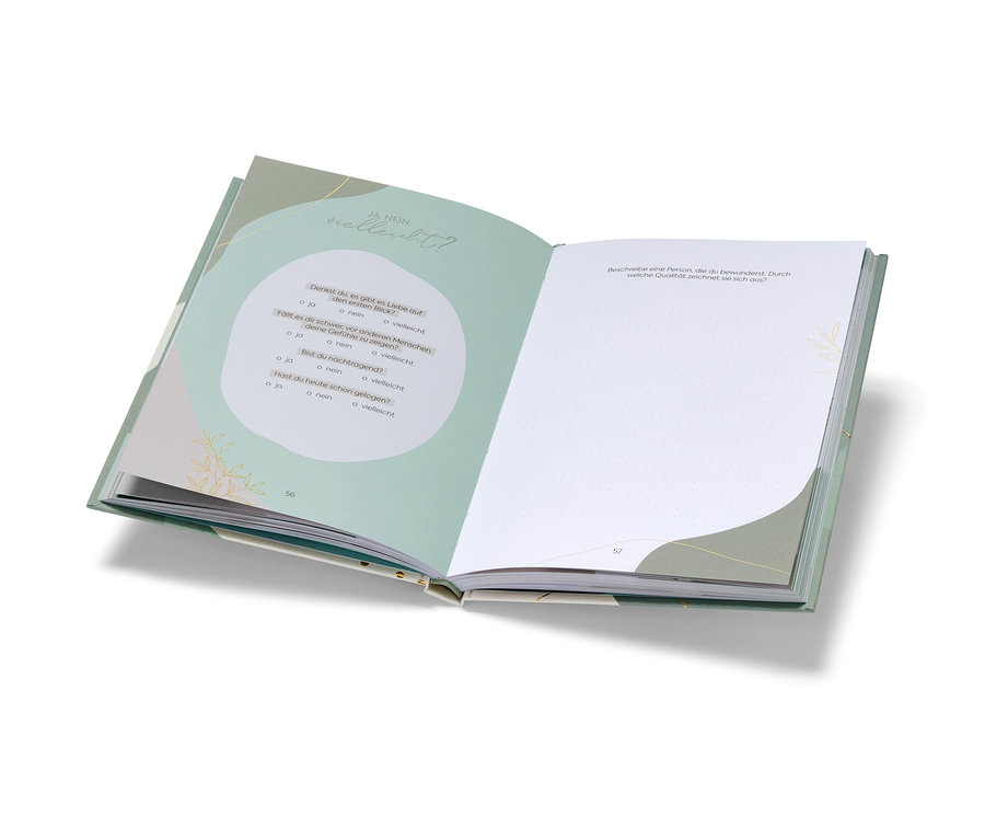 Offenes Buch "Deine Verabredung mit dir selbst" mit Fragen und leeren Seiten.