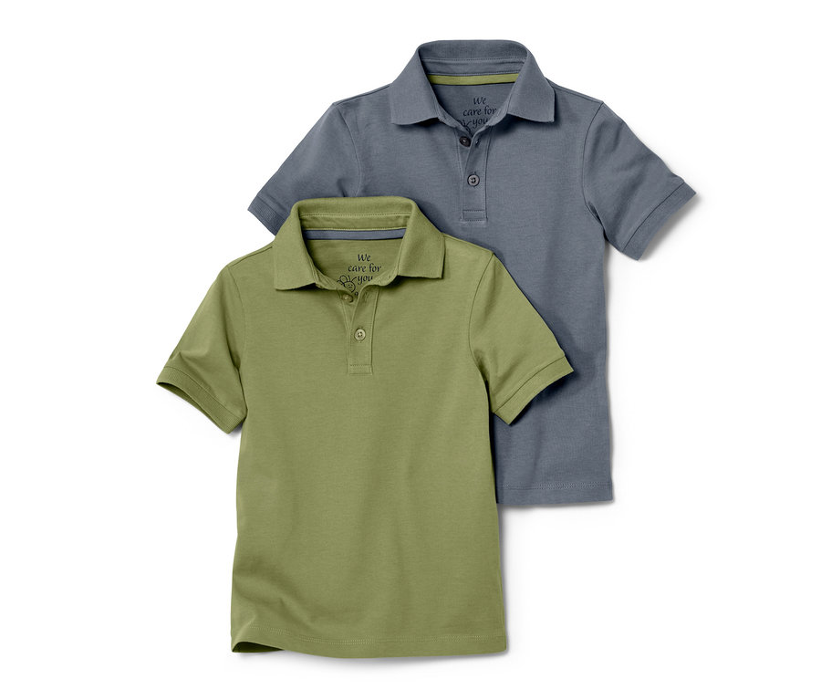 Zwei Kleinkinder-Poloshirts liegen übereinander.