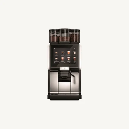Ein Kaffeevollautomat mit Touchscreen und drei Behältern für Kaffeebohnen.