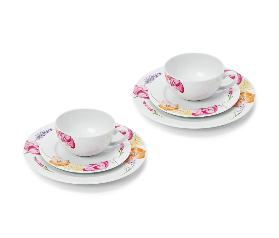 Zwei Gedecke eines 6-teiligen Kaffeegedecks mit Blumendesign.