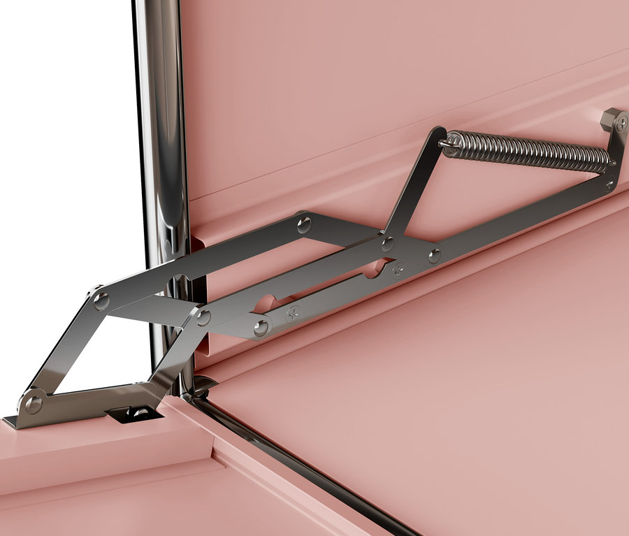 Detail des Öffnungsmechanismus eines rosafarbenen Schranks.