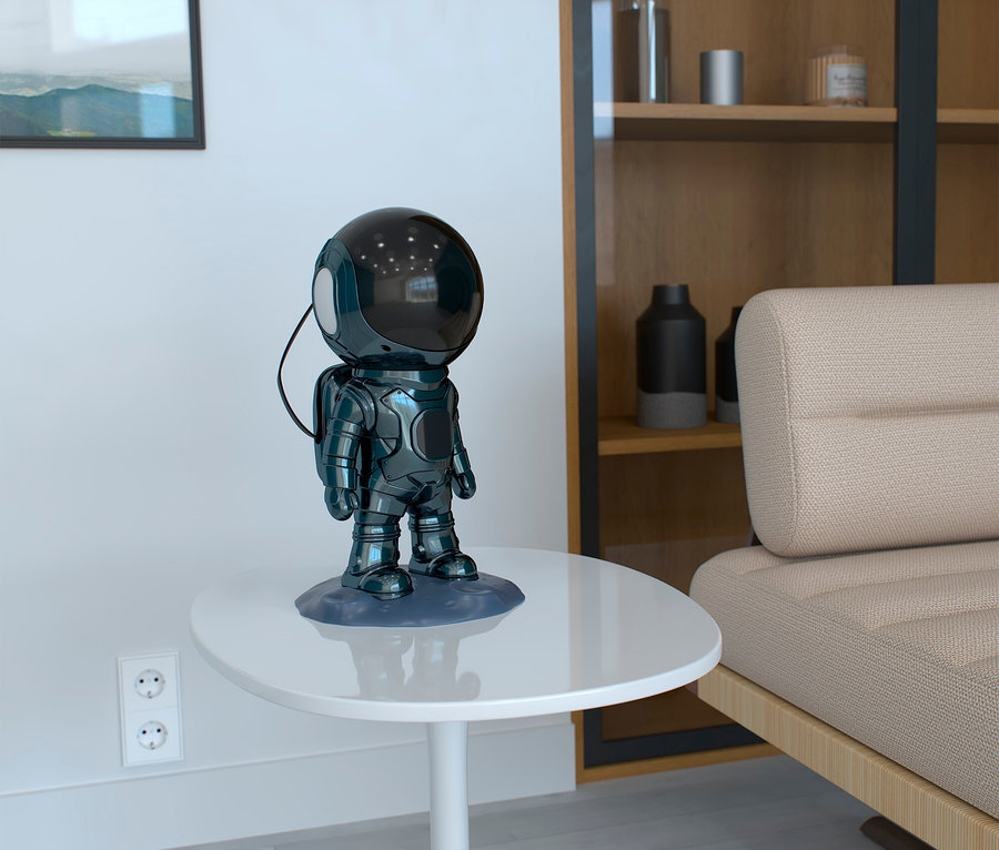 Eine Astronautenlampe steht auf einem weißen Tisch im Wohnzimmer.