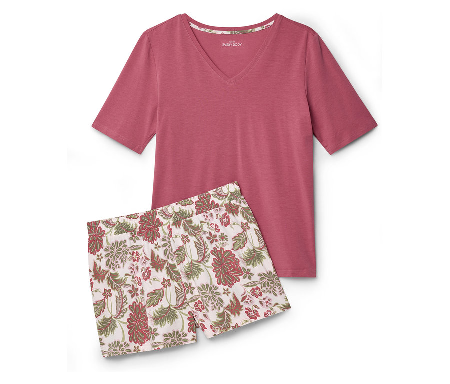 Ein rosafarbenes Kurzarm-Oberteil und Shorts mit Blumenmuster liegen zusammengefaltet auf einer weißen Oberfläche.