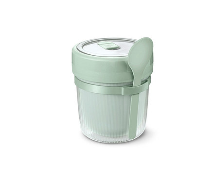 Ein grüner To-go-Suppenbehälter mit Löffel.