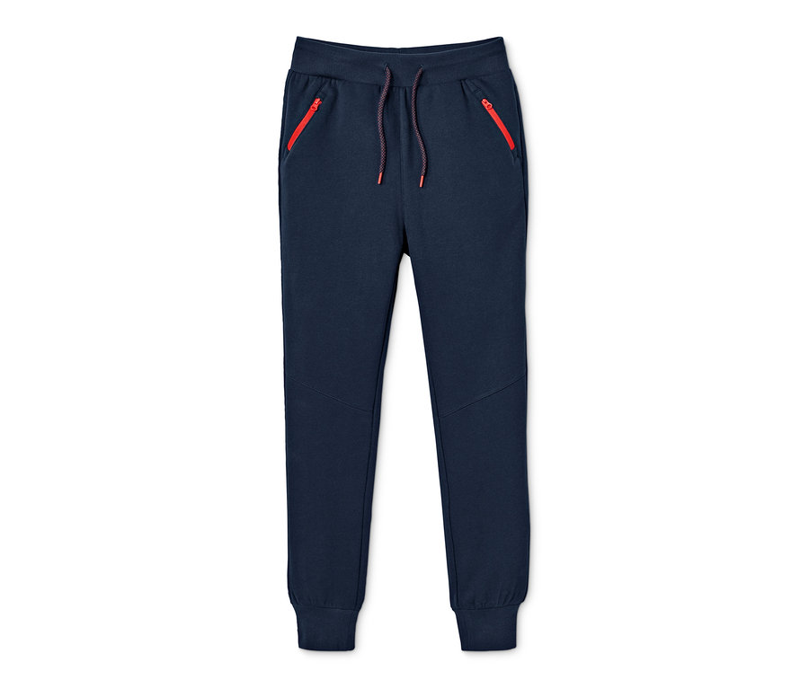Dunkelblaue Sweathose mit roten Reißverschlüssen an den Taschen.
