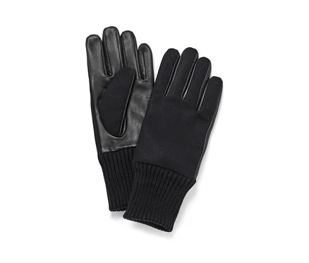 Zwei schwarze Lederhandschuhe liegen nebeneinander.