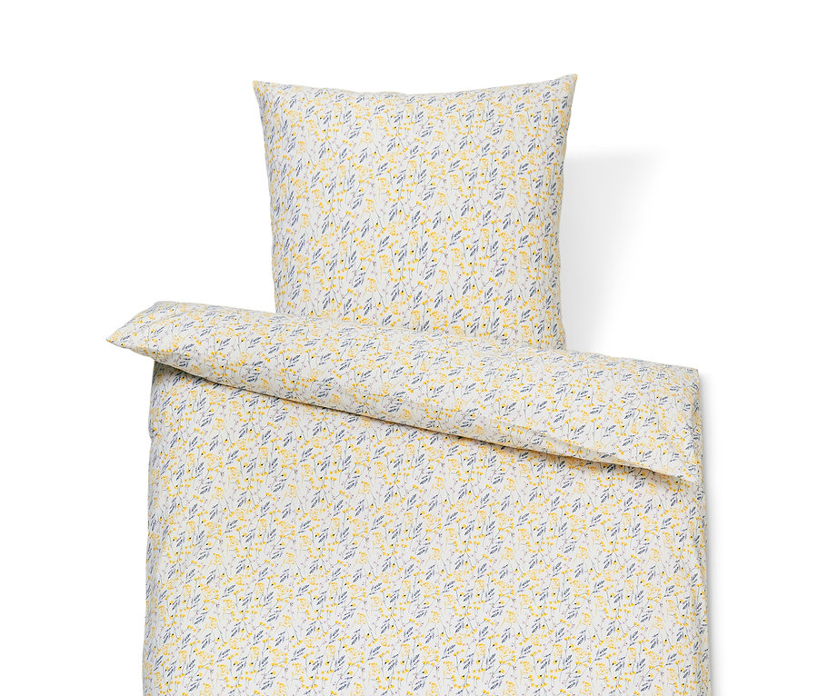 Ein Set Premium-Baumwollbettwäsche mit gelben Blumen und blauen Blättern.
