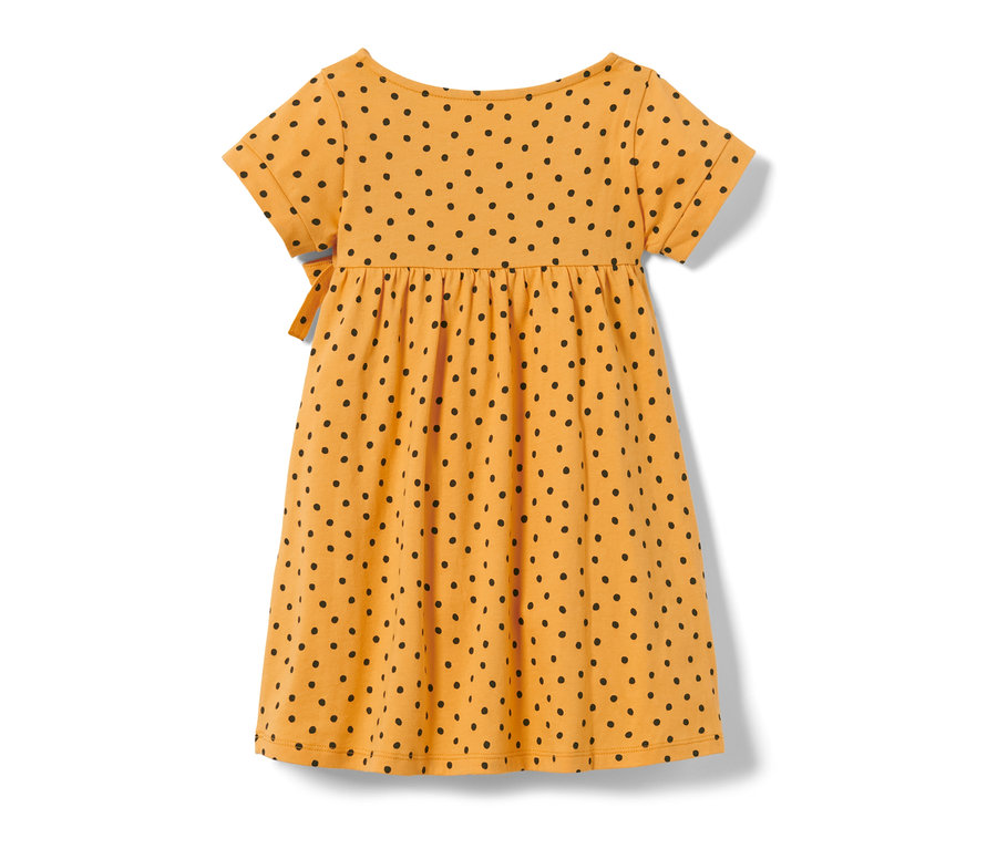 Gelbes Kinder-Jerseykleid mit schwarzen Punkten.