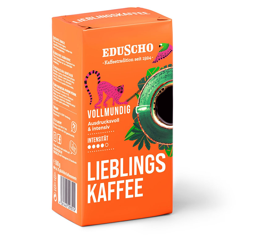 Orangefarbene Packung Eduscho Lieblingskaffee gemahlener Kaffee mit einer Abbildung eines Affen und einer Tasse Kaffee.