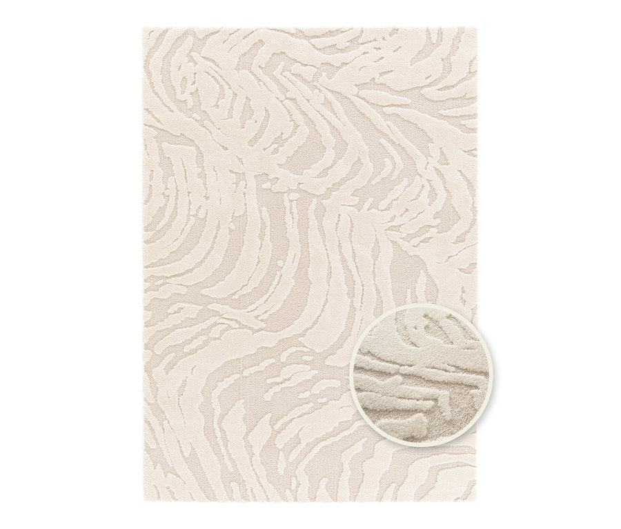 Ein cremefarbener Teppich »Cosmo «Waves mit einem abstrakten Wellenmuster.