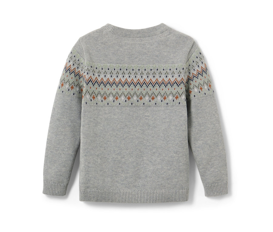 Detailansicht eines Kinder-Strickpullovers mit Muster.