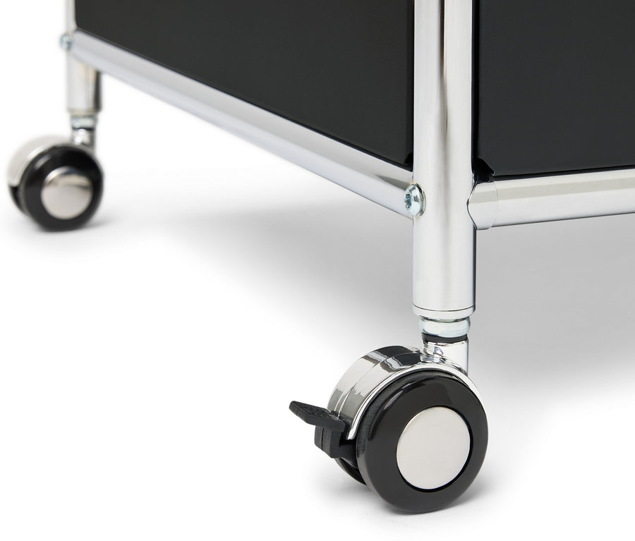 Detail einer Kommode Metall »CN3« mit einer Schublade, einem Klappfach und Umrandung, die auf Rollen steht.