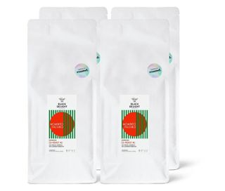 Vier weiße Säcke Black Delight x roasted. - Momento Italiano Co-Roast #2 Espresso - 4x1 kg Ganze Bohne