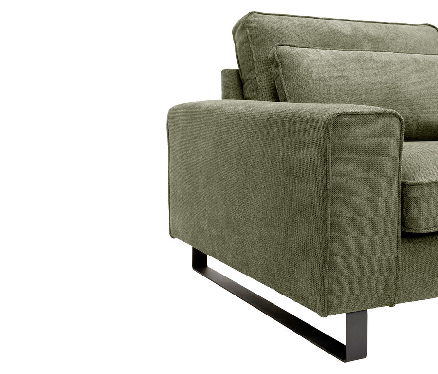 Detailansicht eines olivgrünen Sofas mit schwarzen Metallbeinen.