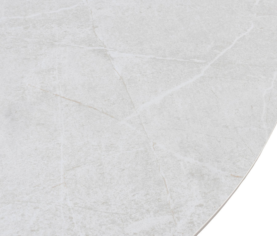 Nahaufnahme einer hellgrauen Tischplatte mit Marmormuster.